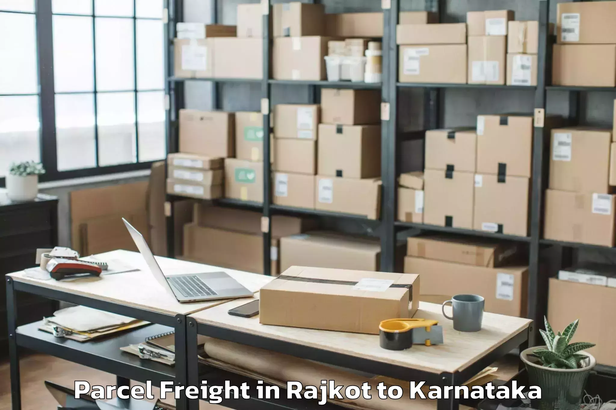 Leading Rajkot to Holalkere Rural Parcel Freight Provider